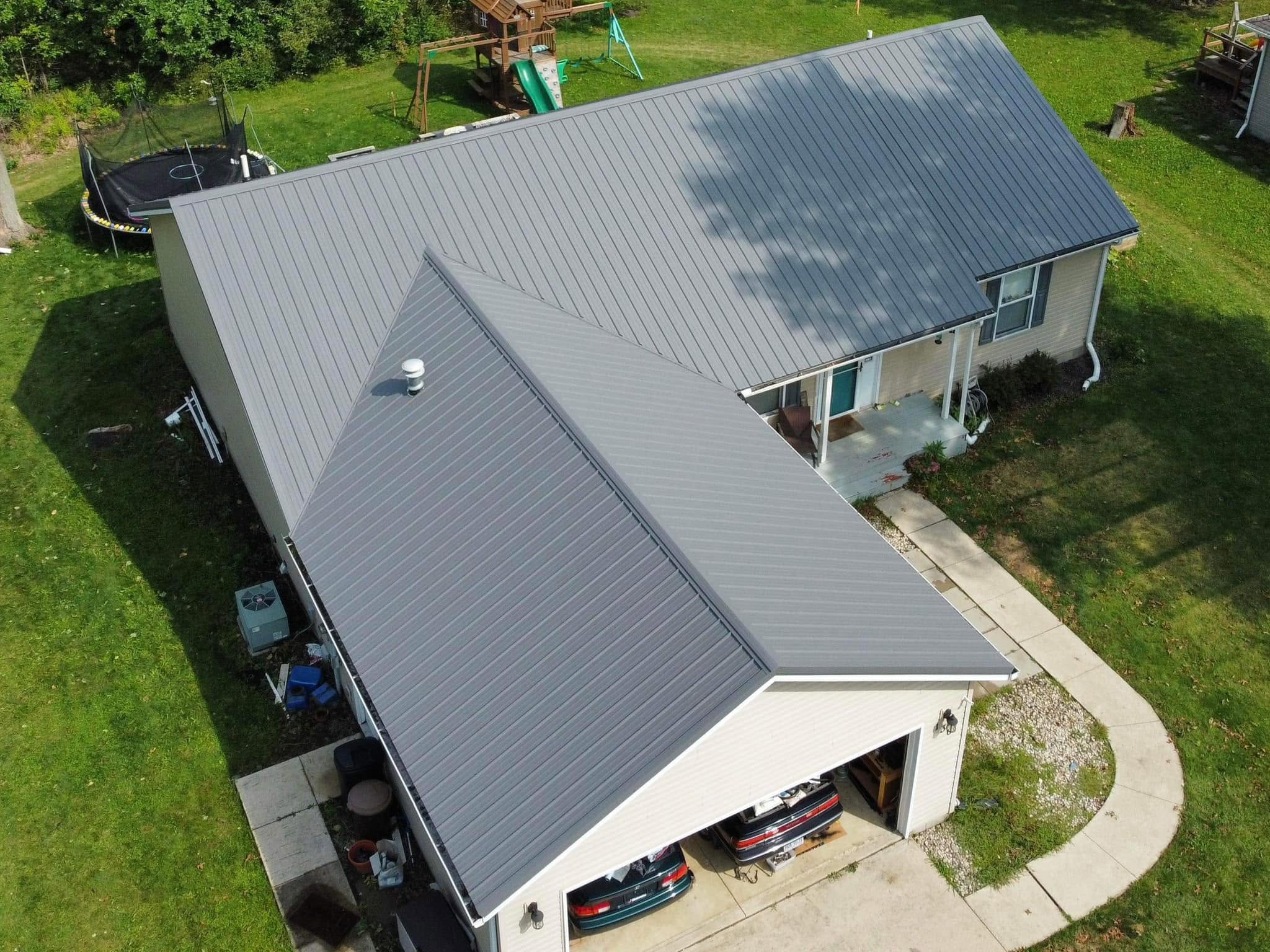 After: new standing-seam metal roof by Stidham's