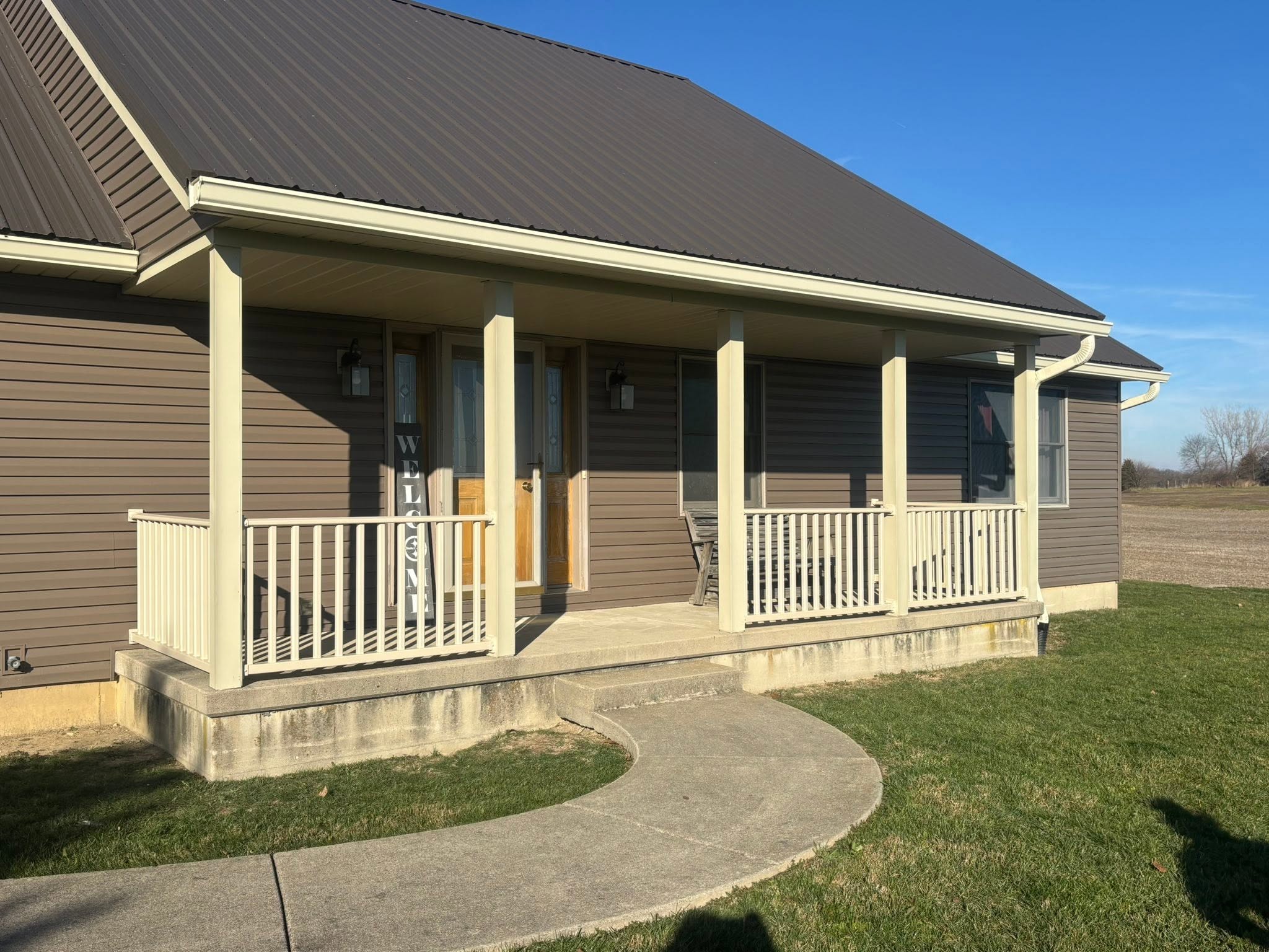 Covered front porch with metal roof