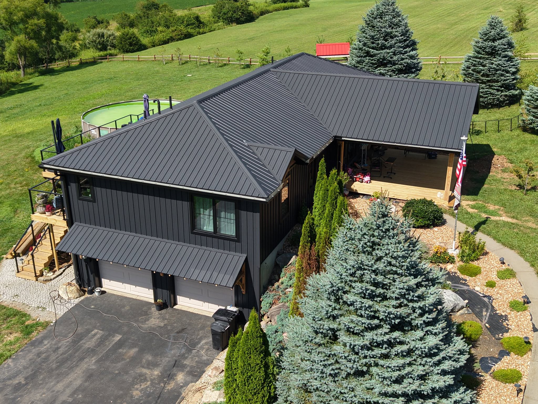 Modern home with new siding and windows by Stidham's